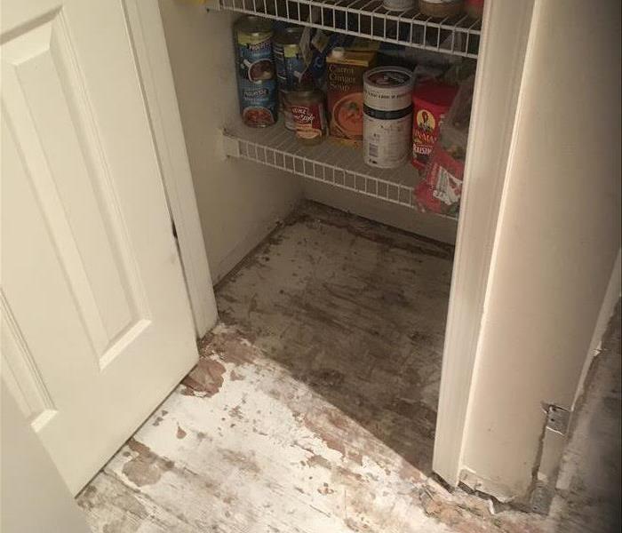 subfloor, white coating in a pantry area